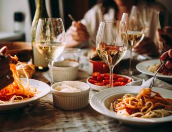 Pasta, wine, and other dishes at an Italian restaurant on Hilton Head Island