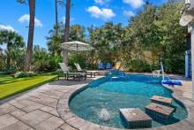 The outdoor swimming pool at 11 East Wind, a vacation rental on Hilton Head Island