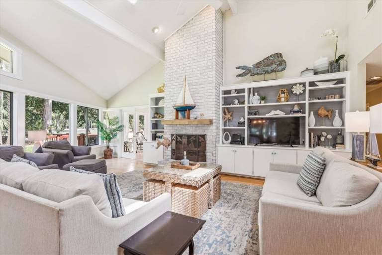 living room view of a Hilton Head vacation rental for the RBC Heritage tournament